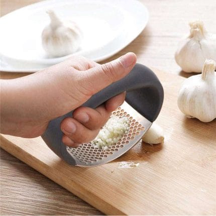 Garlic Press Rocker - Stainless Steel Garlic Mincer and Crusher, Innovative Garlic Chopper with Peeler and Scraper for Easy Garlic Crushing